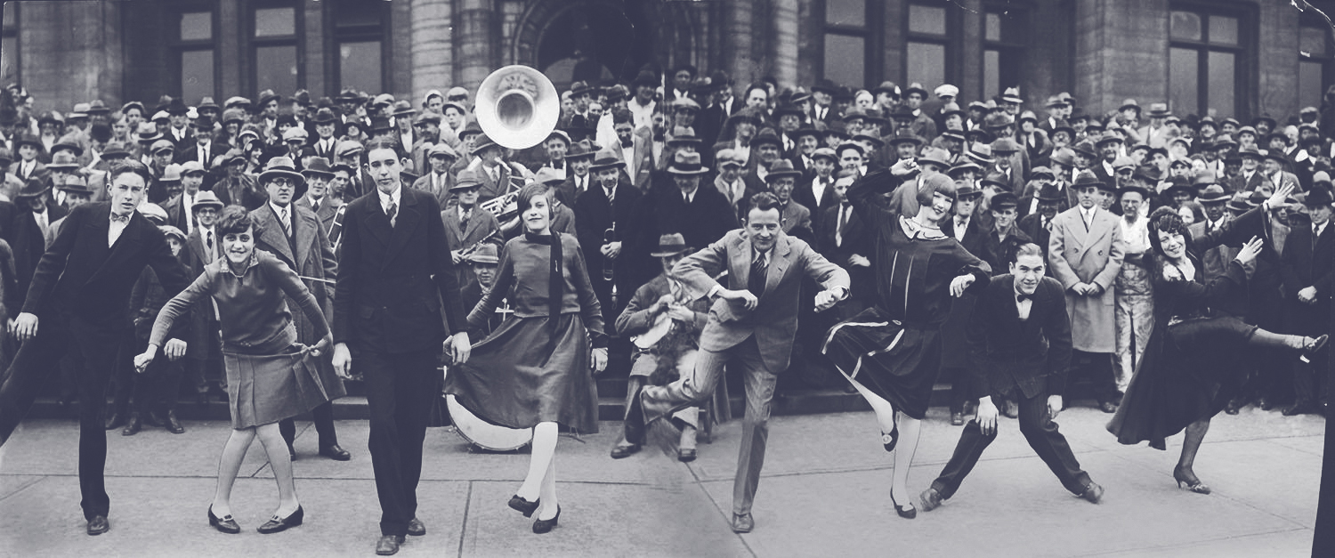 /uploads/FUN-dancers-crowd-band-1920s-joyful-slate.jpg